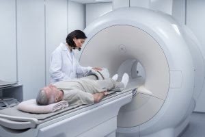 doctor-getting-patient-ready-ct-scan (2)